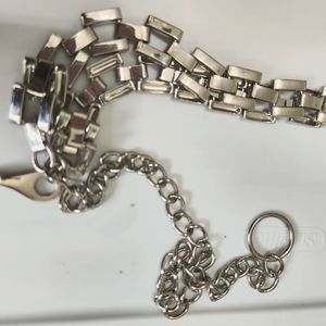 Silver plated buckle belt 2 inch width with chain enclosure.